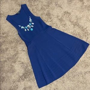 Short blue dress with stones